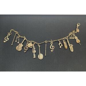 Vintage Discovery of California Musical Bracelet. 15 Instruments 7” Strong Clasp